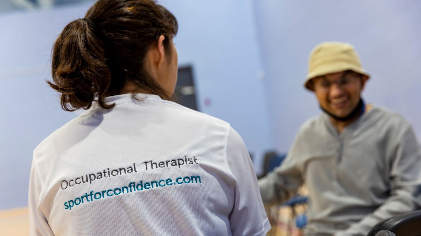 Occupational therapist facing a patient