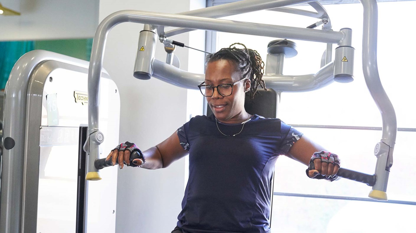woman on weightlifting machine