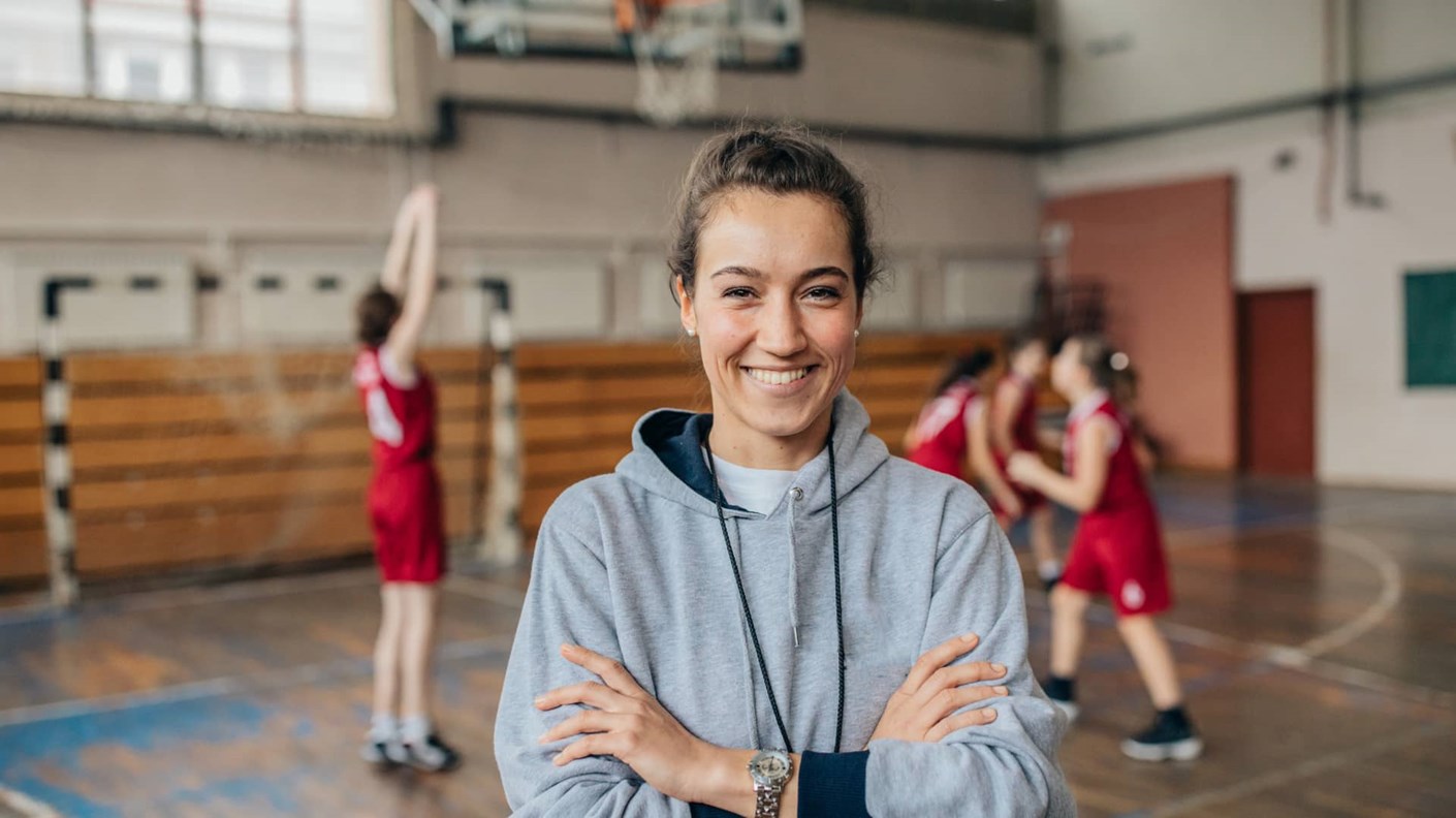 Smiling sports coach