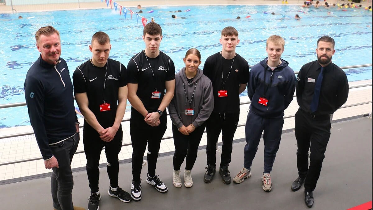 lifeguard group next to pool