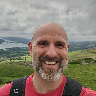 Andy McGill smiling at the camera