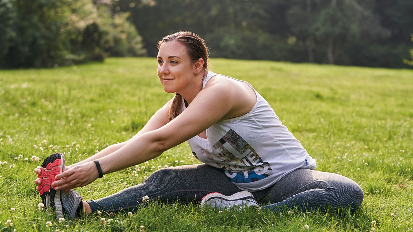 woman stretching outside