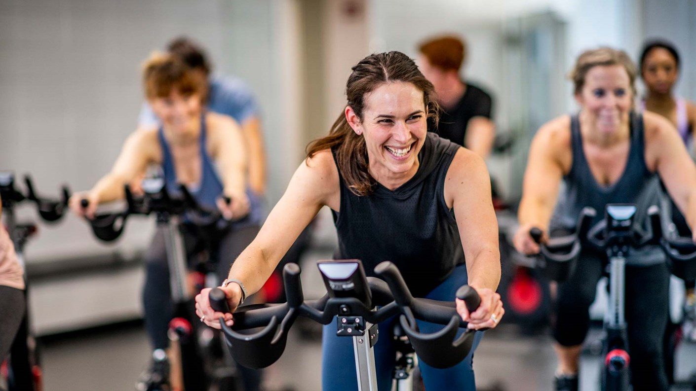 women spin cycling