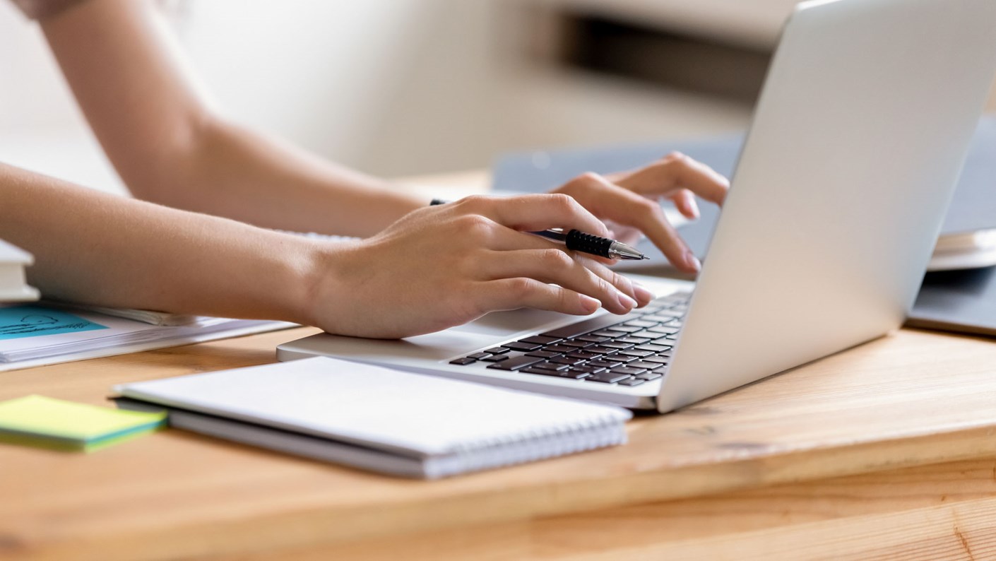 A person working at a laptop