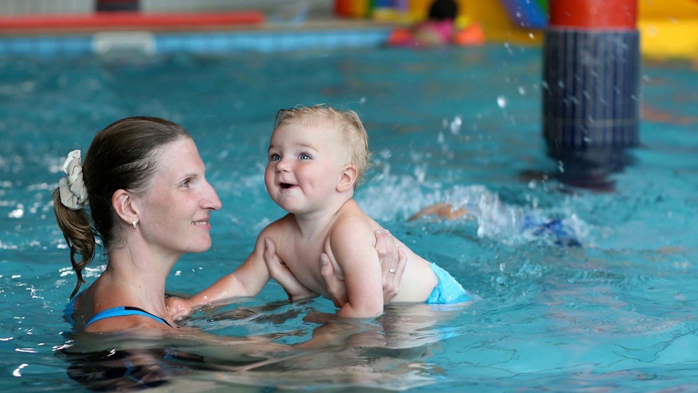 mother and child in pool