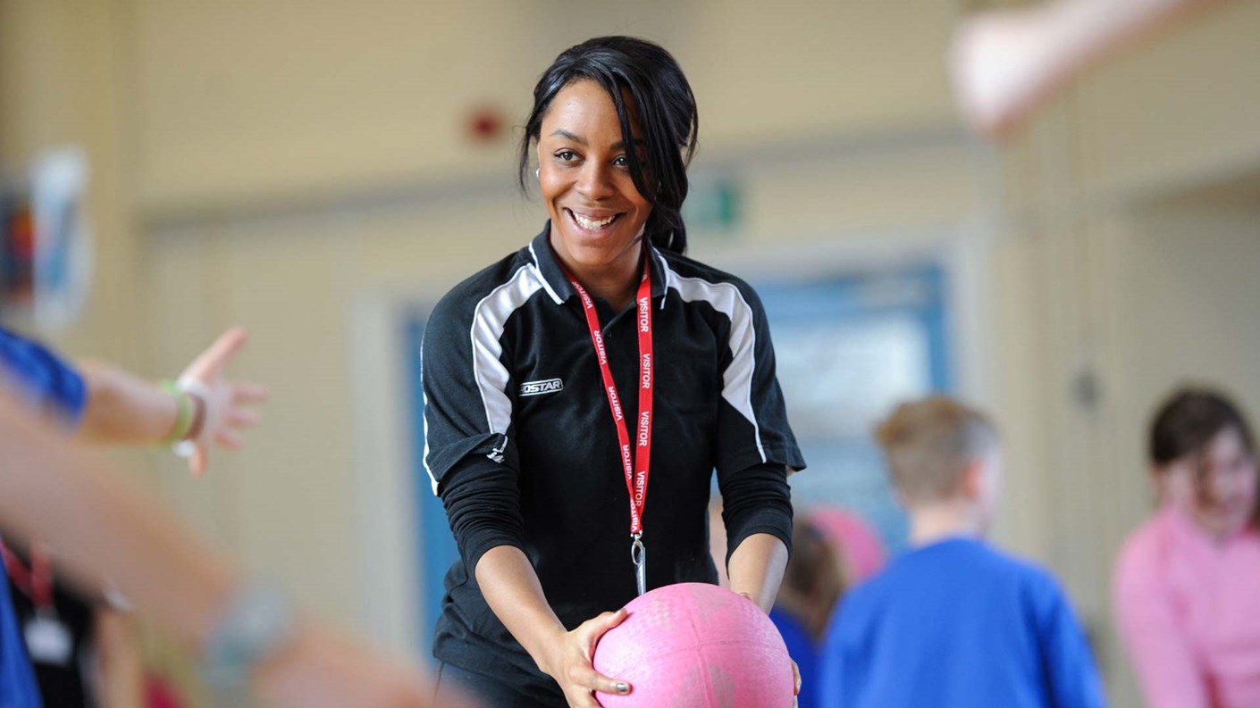 student with ball